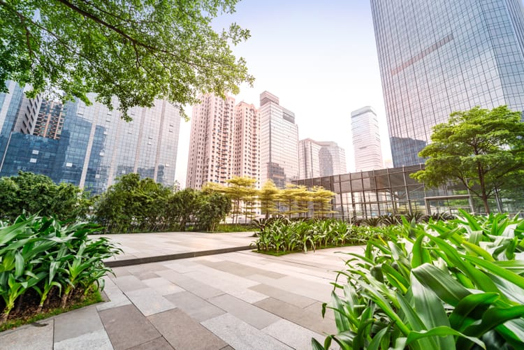 Modern cities embracing green infrastructure: integrating planting and permeability into dense urban environments. Source: Envato Elements.